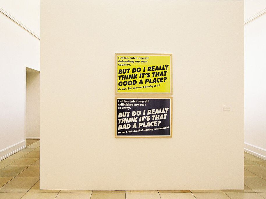 Blick in die Ausstellung This Land is My Land mit Plakat von Lise Harlev 2006